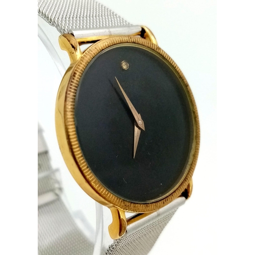 938 - A Vintage Gold Plated Raymond Weil Gents Dress Watch. Stainless steel strap. Gold plated case - 31mm... 