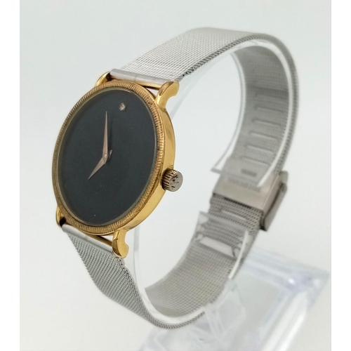 938 - A Vintage Gold Plated Raymond Weil Gents Dress Watch. Stainless steel strap. Gold plated case - 31mm... 