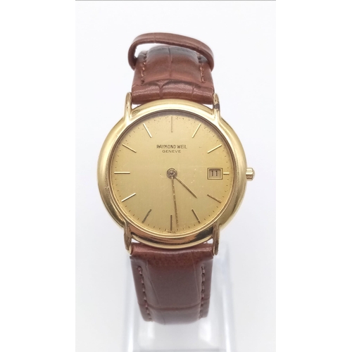 A Gold Plated Raymond Weil 9140 Gents Watch. Brown leather  display picture 1