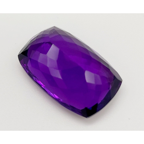 203 - A very admirable, large (22.85 carats) amethyst. Cushion cut, with strong colour saturation and unif... 