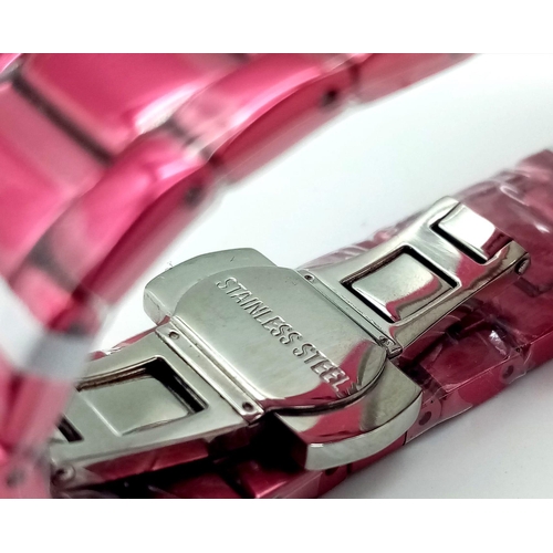 847 - A Vivienne Westwood - Let it Rock Watch. Pink metal strap and case - 35mm. Quartz movement. As new, ... 