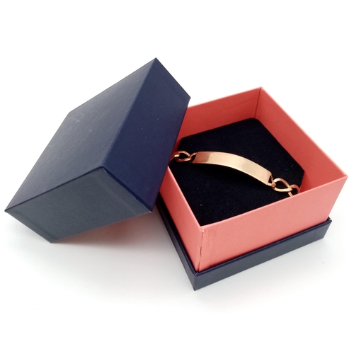 105 - A unisex, 18 K yellow gold identity bracelet with safety chain in a presentation case. Length: 22 cm... 