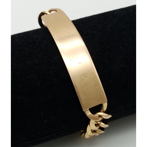 105 - A unisex, 18 K yellow gold identity bracelet with safety chain in a presentation case. Length: 22 cm... 