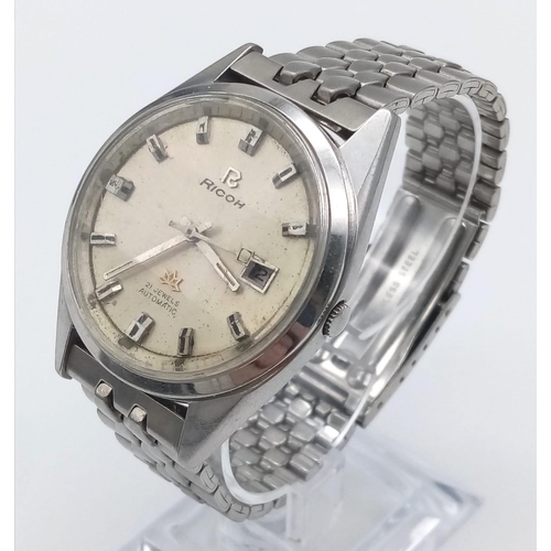 1238 - A Vintage Ricoh Automatic 21 Jewel Gents Watch. Stainless steel strap and case - 38mm. Cream dial wi... 