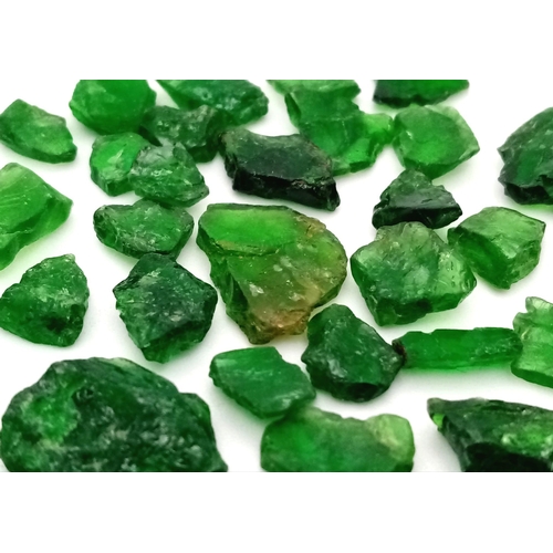 1288 - 76.550ct Natural Tsavorite Garnet. Rough Lot. GLI Certificate.