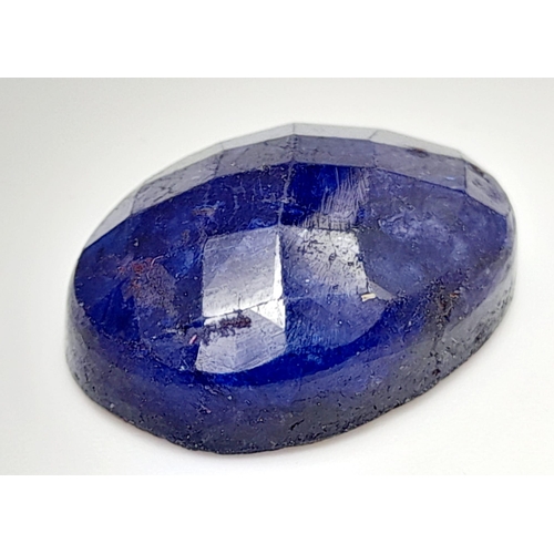 1323 - A 12.67ct Faceted Blue Quartz, in an Oval Shape. Color Enhanced. Come with the IGL&I Certificate