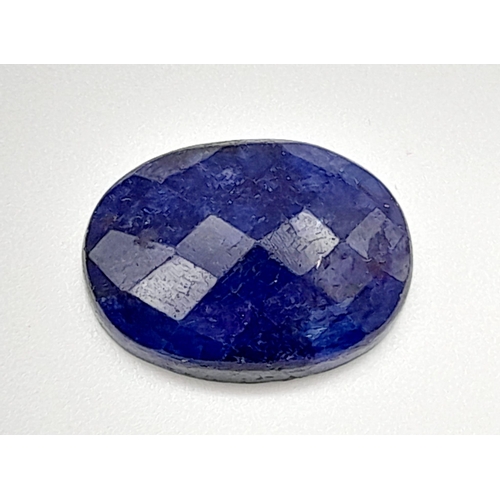 1323 - A 12.67ct Faceted Blue Quartz, in an Oval Shape. Color Enhanced. Come with the IGL&I Certificate