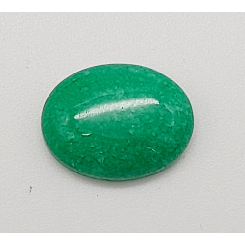 1413 - A 7.15ct Natural Beryl Emerarld, in an Oval Cabochon shape. Colour Enhanced. Come with the GLI Certi... 