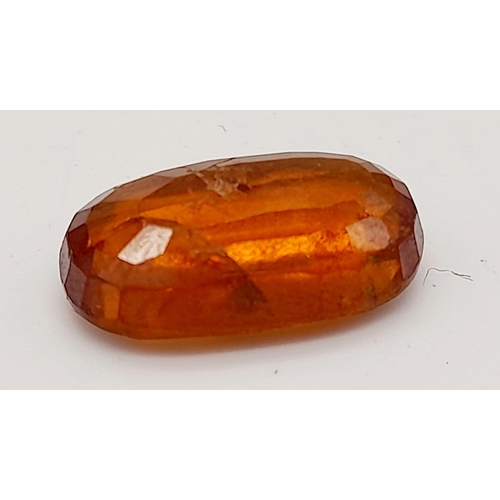 1420 - A 6.90ct Faceted Natural Hessonite Garnet, in an Oval Shape cut. Come with the GLI Certificate.