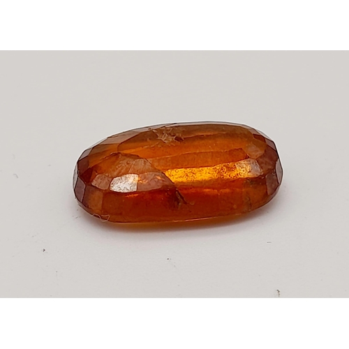 1420 - A 6.90ct Faceted Natural Hessonite Garnet, in an Oval Shape cut. Come with the GLI Certificate.