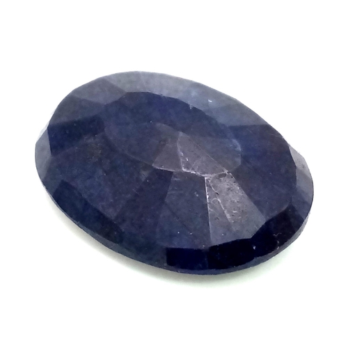 1497 - A 18.15 Ct  Natural Faceted  Blue Sapphire, in an Oval mix shape. Color Enhanced. Comes with the GLI... 