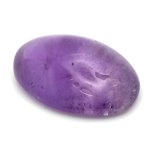 1511 - A 22.35ct Natural Amethyst, in an Oval Cabochon Shape. Comes with a GLI Certificate