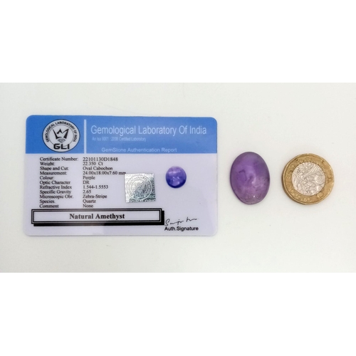 1511 - A 22.35ct Natural Amethyst, in an Oval Cabochon Shape. Comes with a GLI Certificate