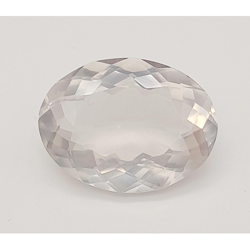 1779 - A 12.40ct Faceted Natural Rose Quartz in an Oval Shape. Come with the GLI Certified