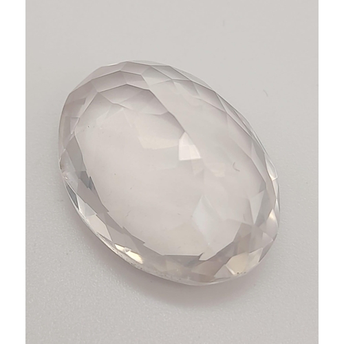 1779 - A 12.40ct Faceted Natural Rose Quartz in an Oval Shape. Come with the GLI Certified