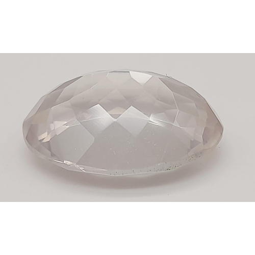 1779 - A 12.40ct Faceted Natural Rose Quartz in an Oval Shape. Come with the GLI Certified