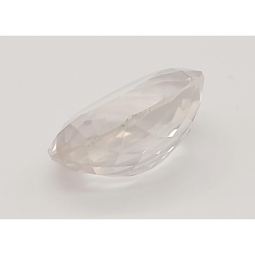 1779 - A 12.40ct Faceted Natural Rose Quartz in an Oval Shape. Come with the GLI Certified