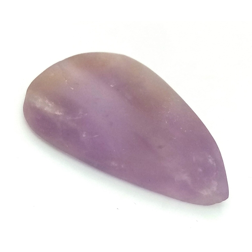 1800 - A 52.85 Ct Unpolished, Natural Amethyst, in a Pear Cabochon Shape. Comes with the GLI Certificate.