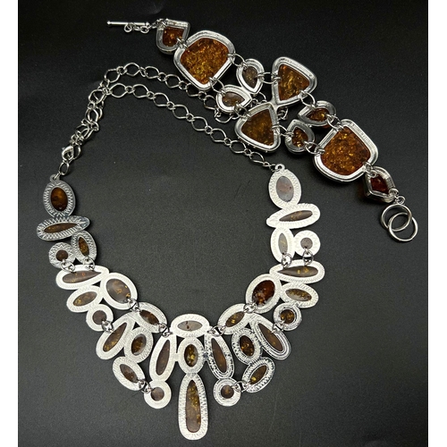 196 - A very substantial amber necklace and bracelet set in a presentation case. Total weight: 116 g