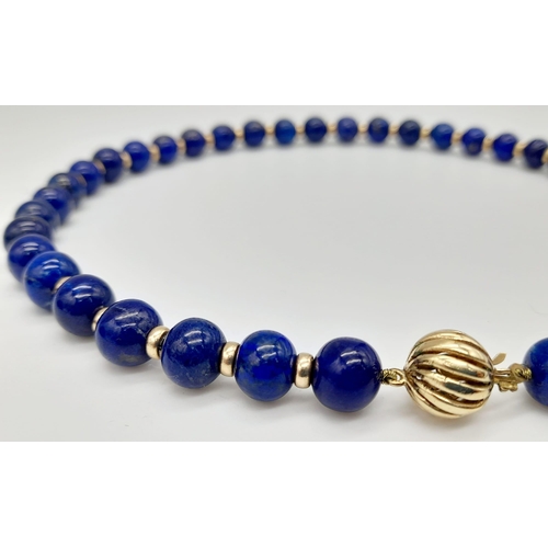 295 - A Gorgeous Lapis Lazuli Bead Choker Necklace with a 9K Gold (hallmarked) Globe Clasp. 8mm lapis bead... 