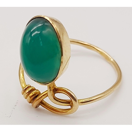 436 - A 14k Gold Russian Jade Cabochon Ring. Size I 1/2. 1.67g total weight.