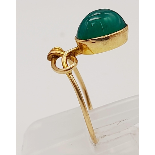 436 - A 14k Gold Russian Jade Cabochon Ring. Size I 1/2. 1.67g total weight.