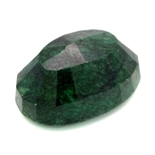 454 - A 628.40 Ct Faceted Emerald in an Oval Shape. Color Enhanced