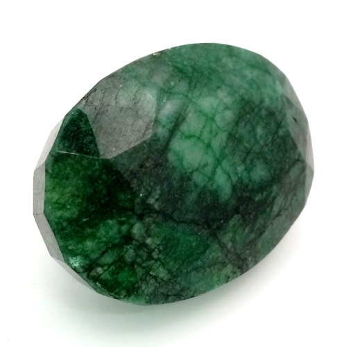 454 - A 628.40 Ct Faceted Emerald in an Oval Shape. Color Enhanced