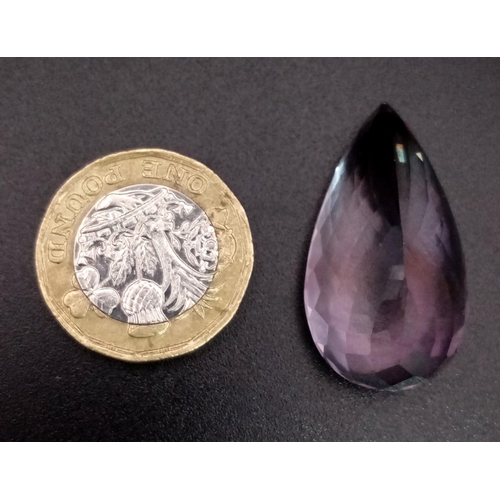 826 - A 47.30ct Natural Amethyst, in Pear cut shape
Size: 31 x 17 x15.7 mm approx