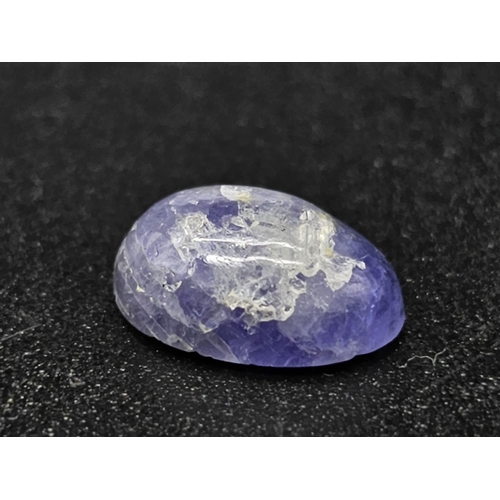 883 - A 4.13ct Natural Tanzanite, in an Oval Cabochon Shape. Come with IGL&I Certificate.