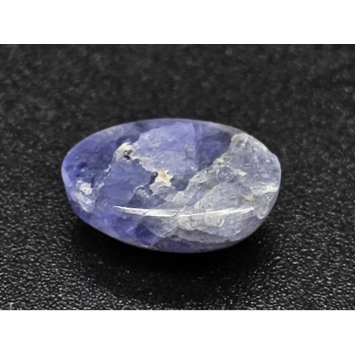 883 - A 4.13ct Natural Tanzanite, in an Oval Cabochon Shape. Come with IGL&I Certificate.