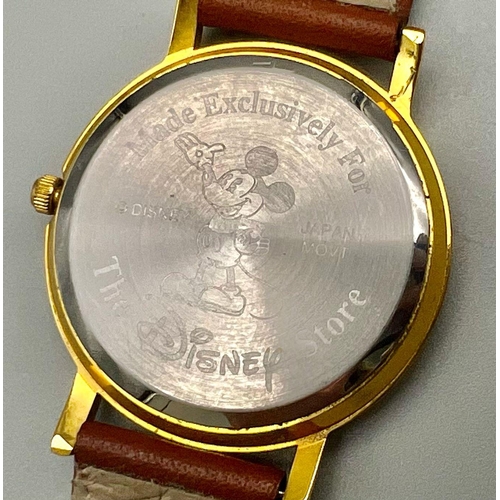 959 - A Disney Store Winnie the Pooh Quartz Watch. Brown leather strap. Two tone case - 36mm. In good cond... 