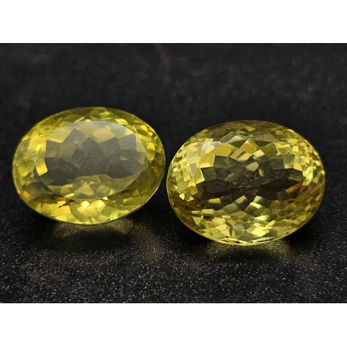 1295 - A Pair of 25ct Oval faceted Citrines.