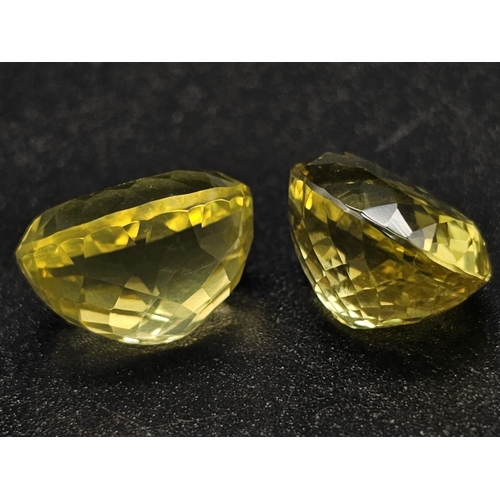 1295 - A Pair of 25ct Oval faceted Citrines.