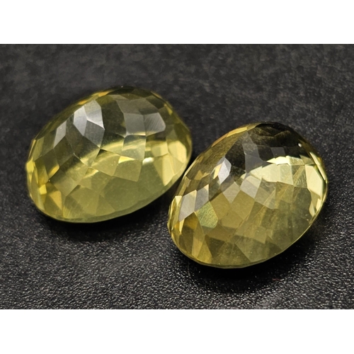 1295 - A Pair of 25ct Oval faceted Citrines.