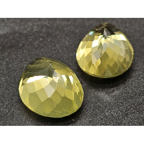 1295 - A Pair of 25ct Oval faceted Citrines.