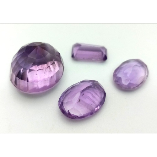 1309 - A Lot of 4 Natural Amethysts. Include: A 20.55ct Oval, A 2.95ct Rectangle cut,  A 4.15ct Oval, and A... 