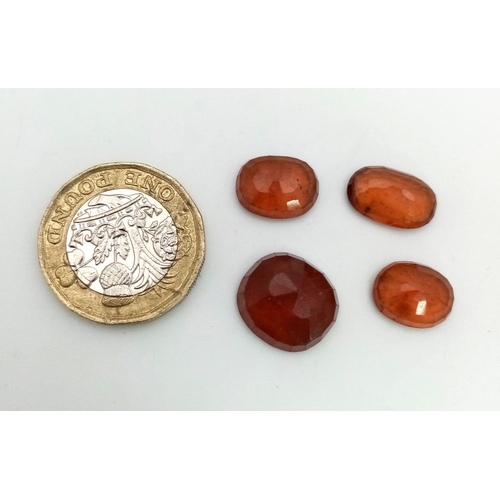 1476 - A 27.05ct Hessonite Garnet lot. 4pcs. Oval Mixed shapes.