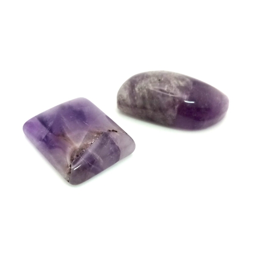 911 - 2 Natural Amethysts. Include: 22.20ct Rectangle & 29.15ct Fancy Shape.