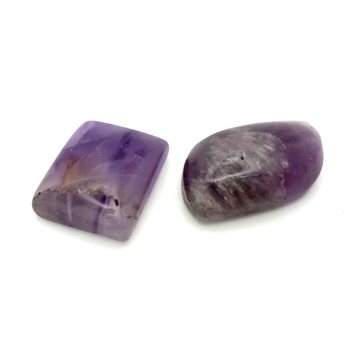 911 - 2 Natural Amethysts. Include: 22.20ct Rectangle & 29.15ct Fancy Shape.