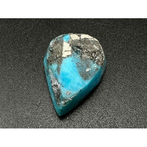 1071 - A 24.16 Ct Natural Turquoise, in a Pear Cabochon Shape. Comes with the IGL&I Certificate