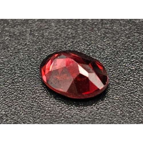 1392 - A 1.52 Ct Faceted Almandine Garnet. In Oval Shape. Comes with GLI Certificate.