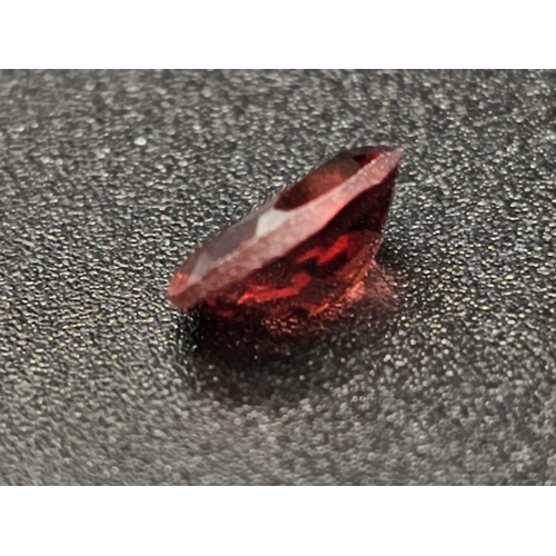 1392 - A 1.52 Ct Faceted Almandine Garnet. In Oval Shape. Comes with GLI Certificate.