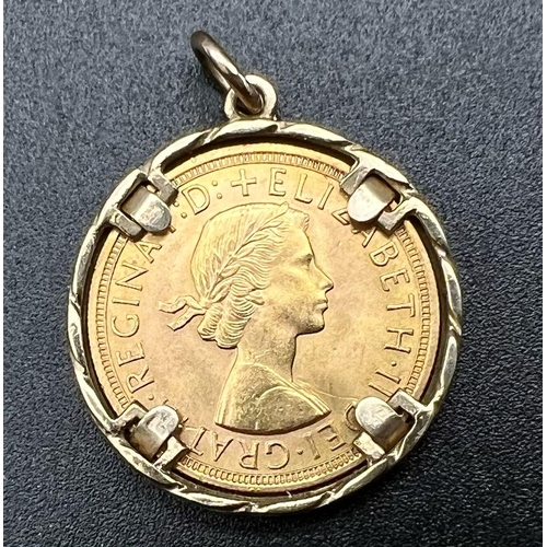 23 - A 22K Gold 1957 Full Sovereign Coin set in a 9k Gold Pendant. 10.75g total weight.