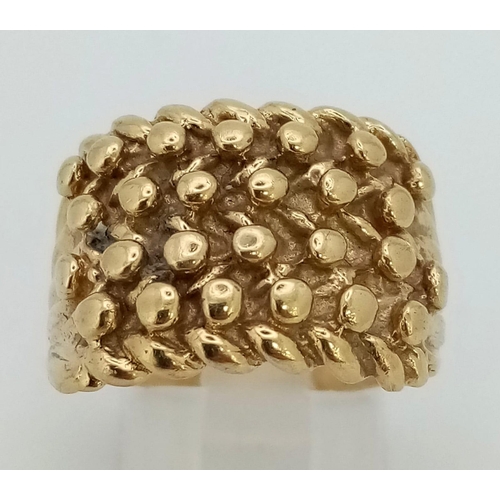 258 - A 9 K yellow gold keeper ring. Size: R, weight: 8.8 g. Ref: 00004343