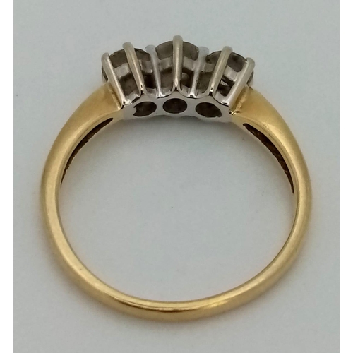 35 - An 18 K yellow gold ring with a trilogy of brilliant cut diamonds. ring size: N, weight: 3 g. Ref: 0... 