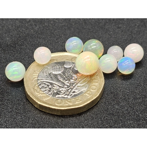 489 - 8.30ct White Fire Opal Spheres. Including 9pcs.