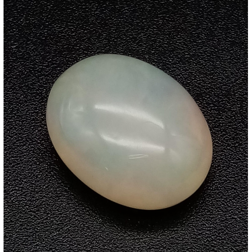 652 - A 6.7ct Ethiopian White Fire Opal . Oval Cabochon.