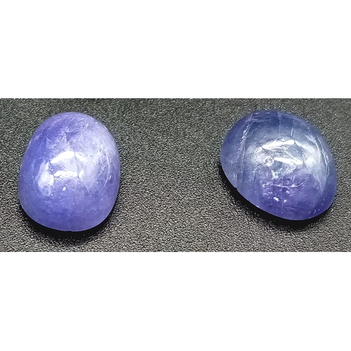 699 - 22.20 Pair of Oval Cabochon Natural Tanzanites.