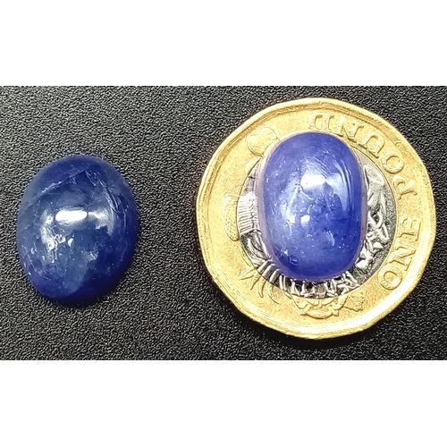 699 - 22.20 Pair of Oval Cabochon Natural Tanzanites.